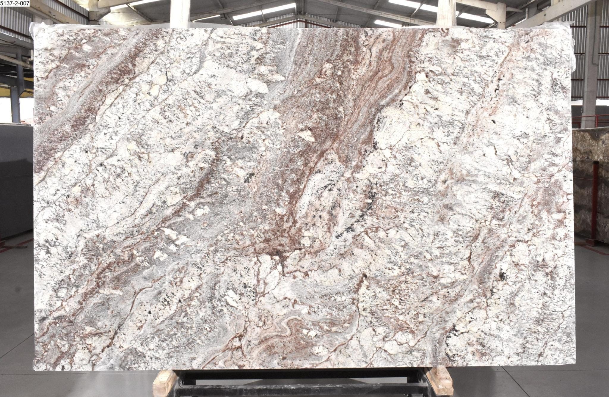 Premium granite slab at the Infinity Yukon warehouse